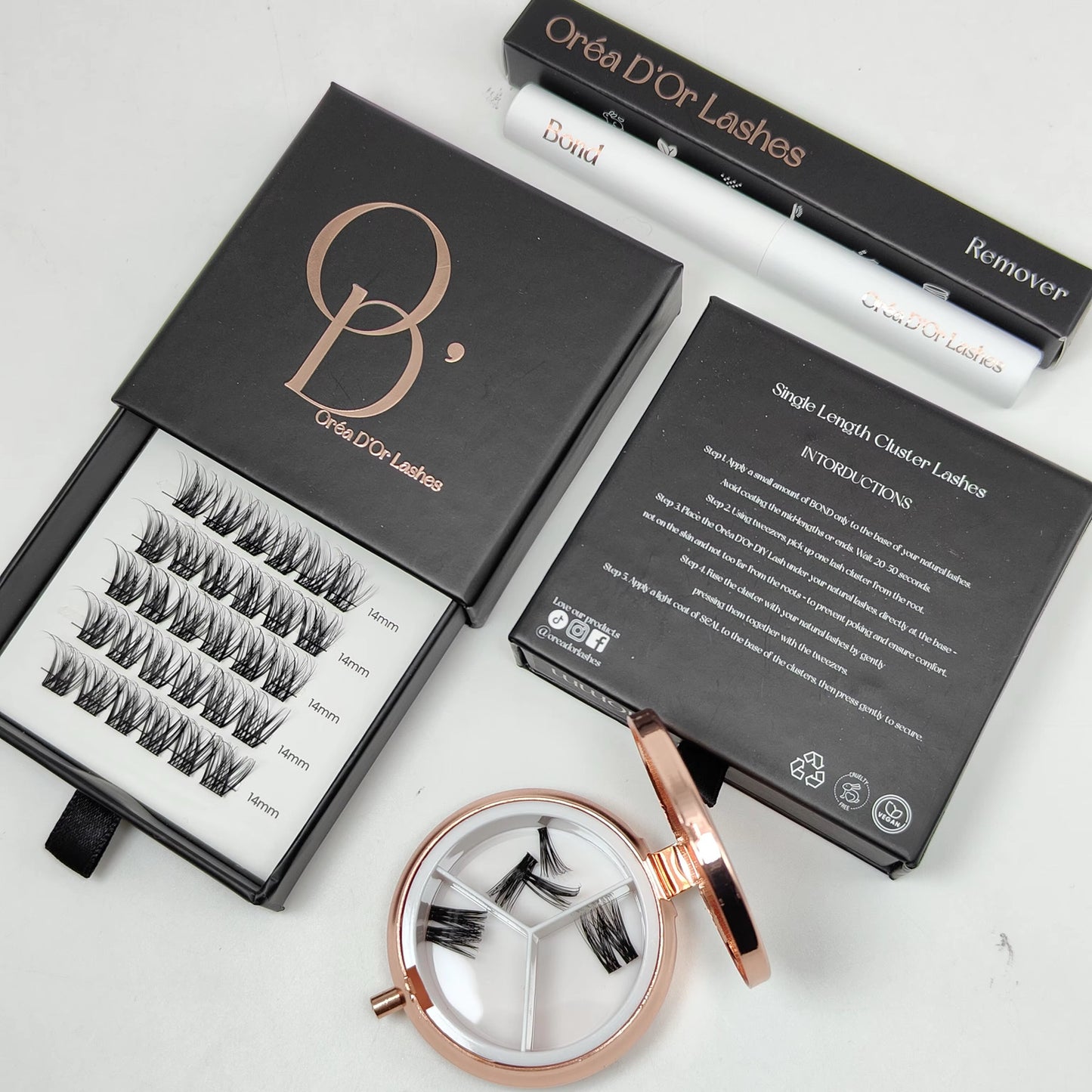 Oréa D'Or Lashes packaging with lashes, remover, and a lash case on a white background